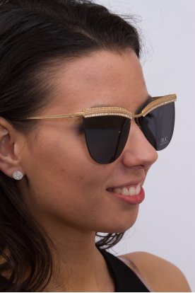 Rendkívül divatos strasszkövekkel díszített női napszemüveg aranyozott szárral
