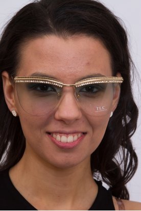 Rendkívül divatos strasszkövekkel díszített női napszemüveg aranyozott szárral
